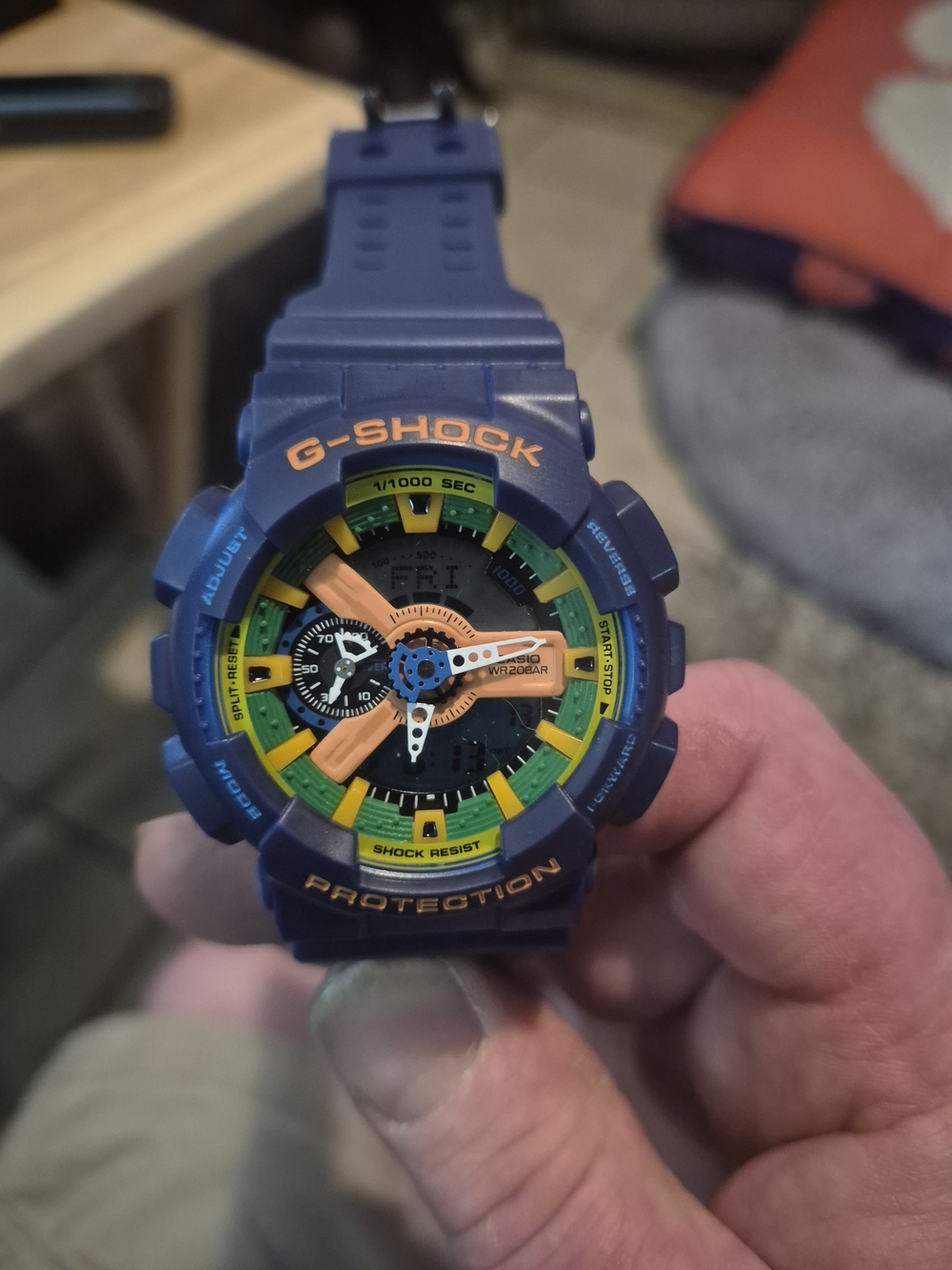 G-Shock Blue Sport Watch with Orange and Yellow Accents